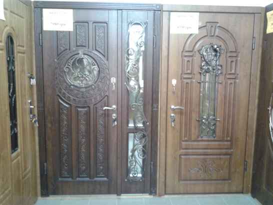Металлические входные двери с мдф накладками и объемными элементами