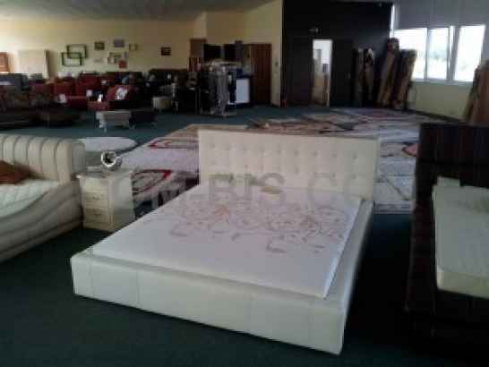 Кровать кожаная TRABOLLINI